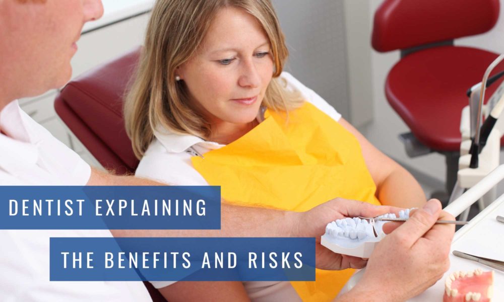 Dentist explaining the benefits and risks at Lambton Family Dental